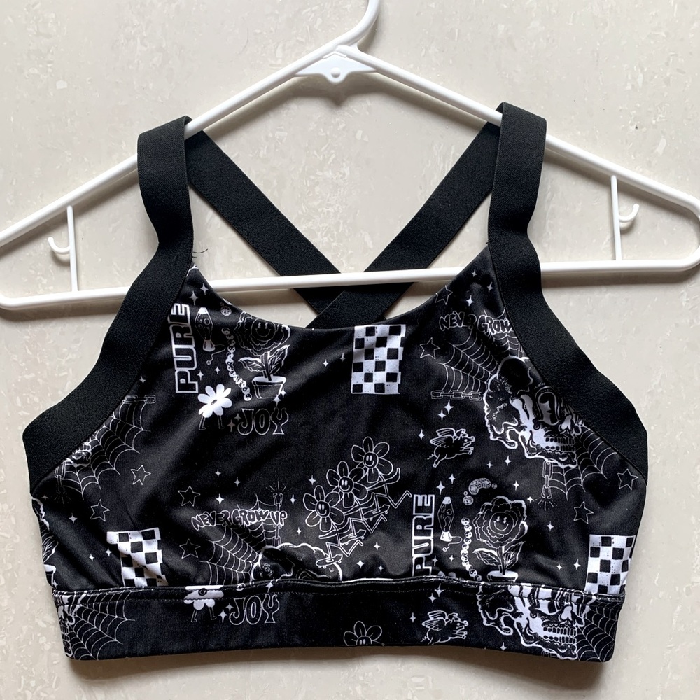 Zumiez black sports bra with white graphics